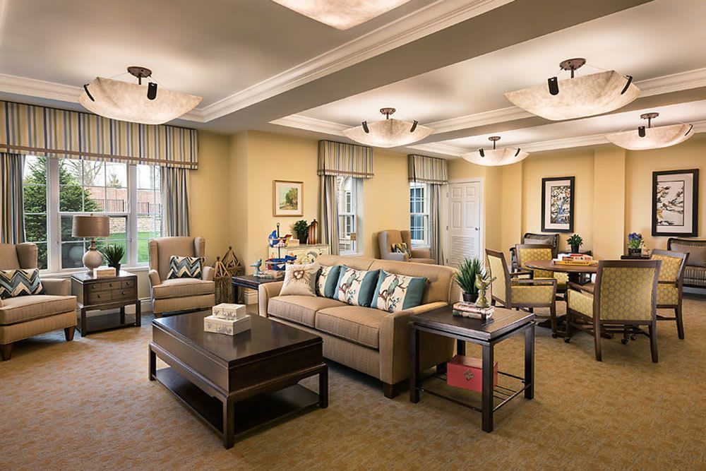 A spacious and cozy living room with modern decor and neutral tones.