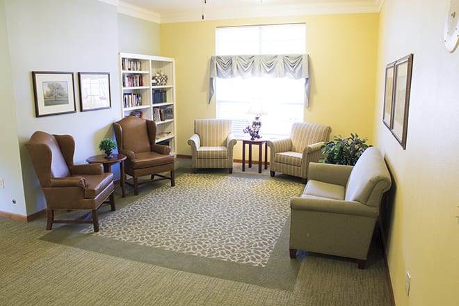 A cozy living room with comfortable seating and natural light.