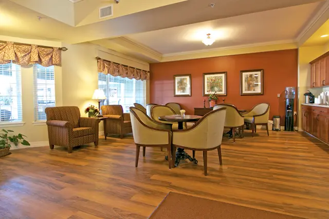 A cozy lounge area with comfortable seating and warm lighting.