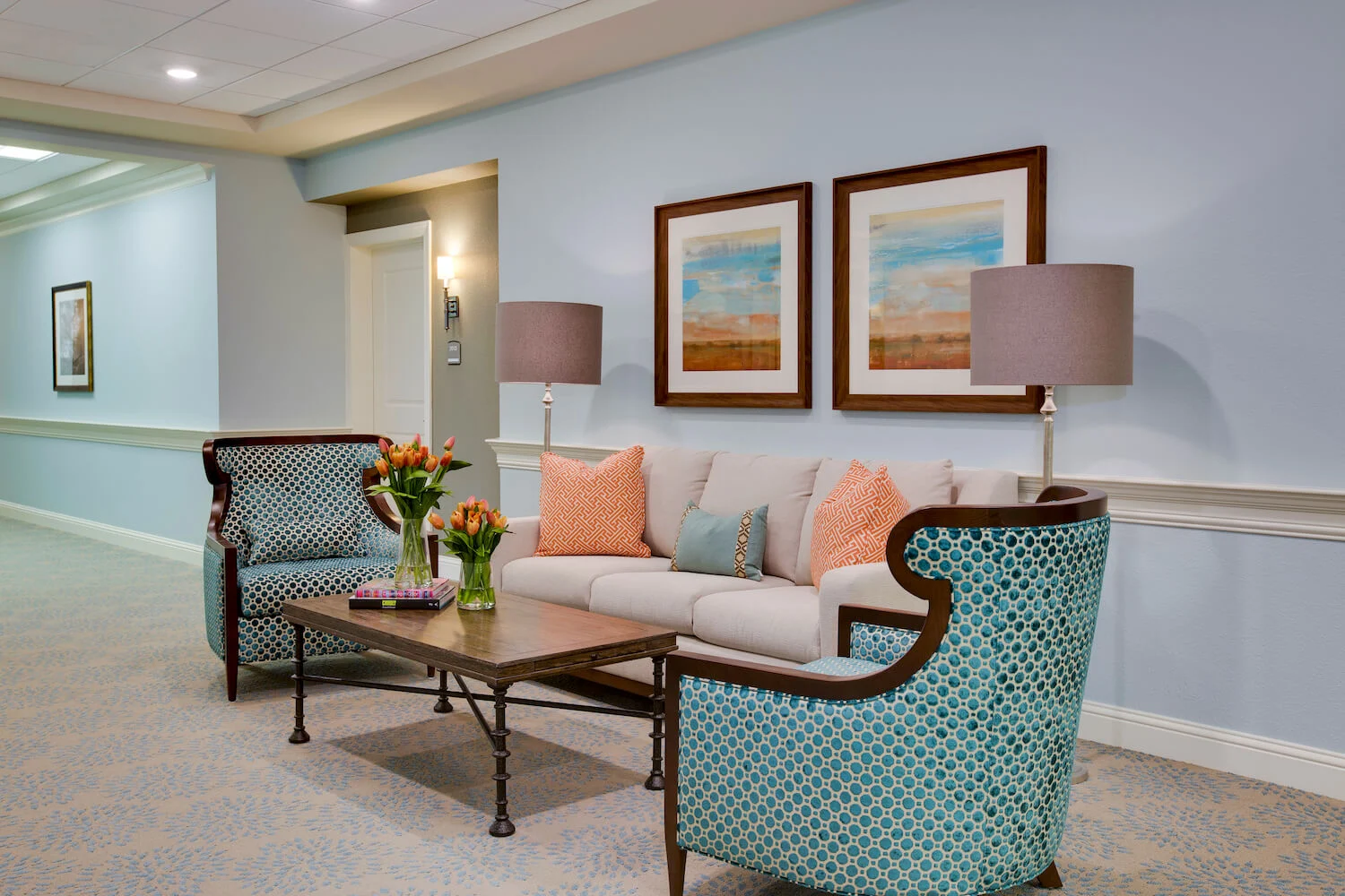 A cozy living room with elegant furniture and tasteful decor.
