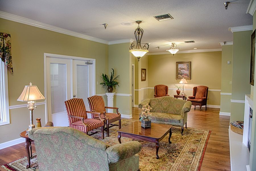 A well-furnished lobby area with seating and elegant decor.