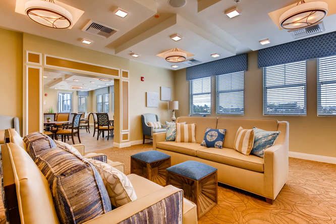 A modern living room with comfortable seating and stylish decor.