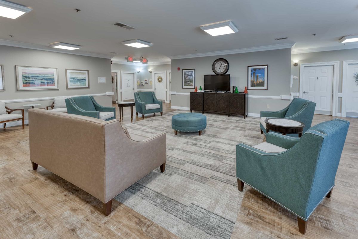 A modern living room with comfortable seating and tasteful decor.