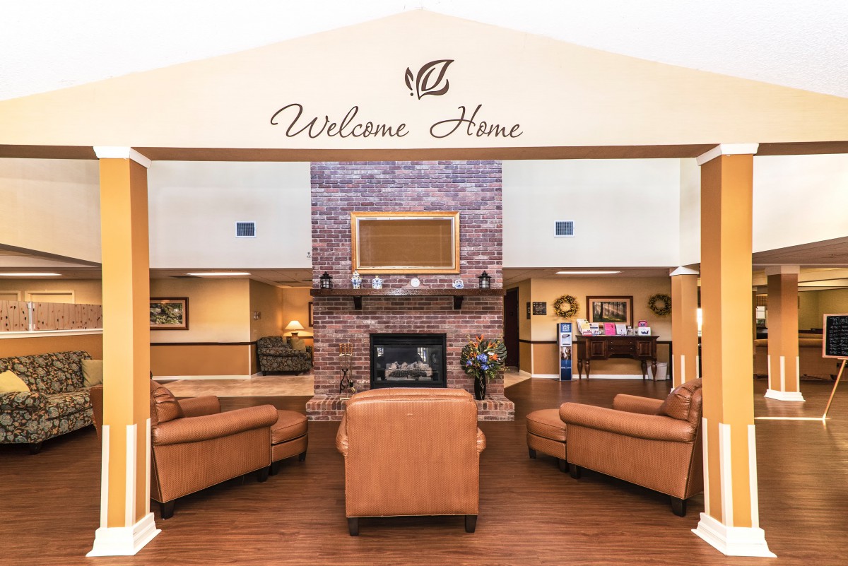 A cozy living room with a fireplace and comfortable seating, welcoming you home.