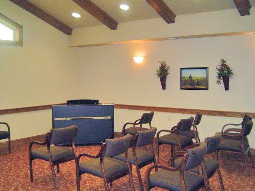 A cozy meeting room with seating arranged for discussions.