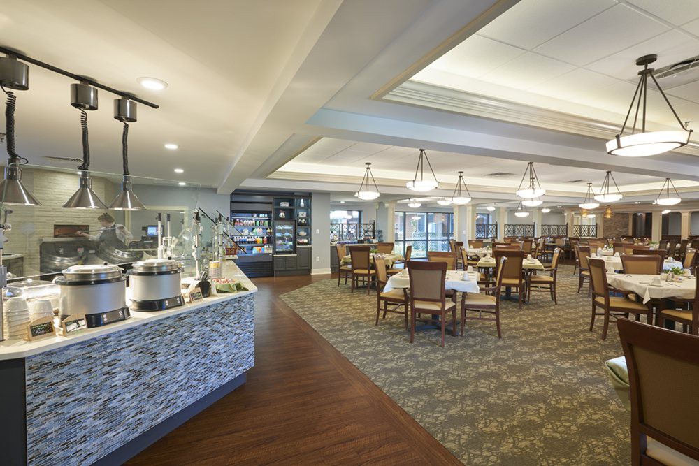 Interior view of a modern dining area with a buffet section.