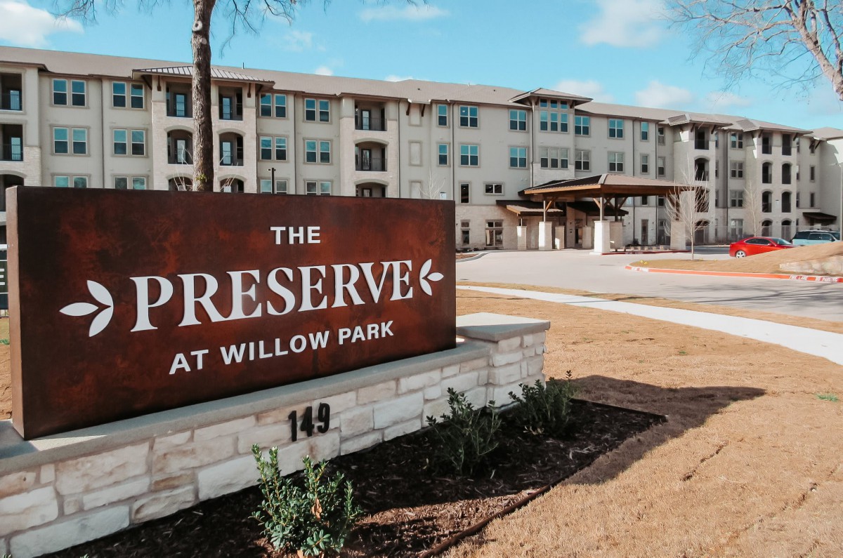 The Preserve at Willow Park entrance with its building in the background.
