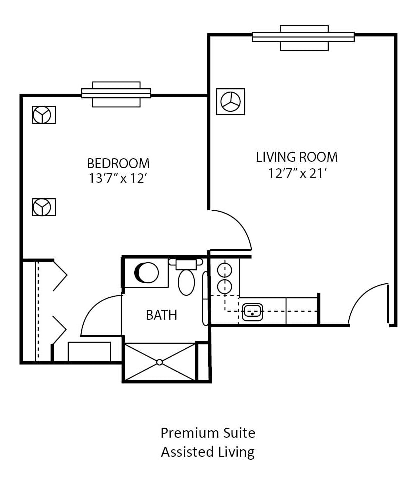 A floor plan of a premium suite featuring a bedroom, living room, bathroom, and kitchen area.