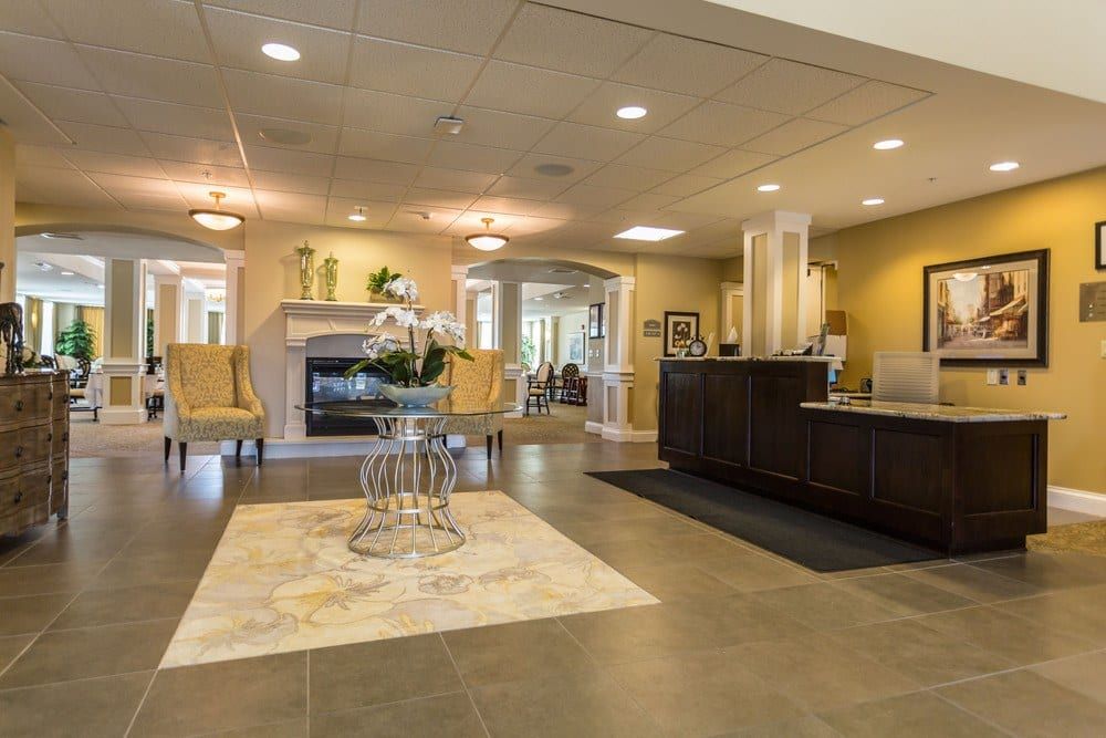 A modern and elegantly designed lobby with comfortable seating and a welcoming reception desk.