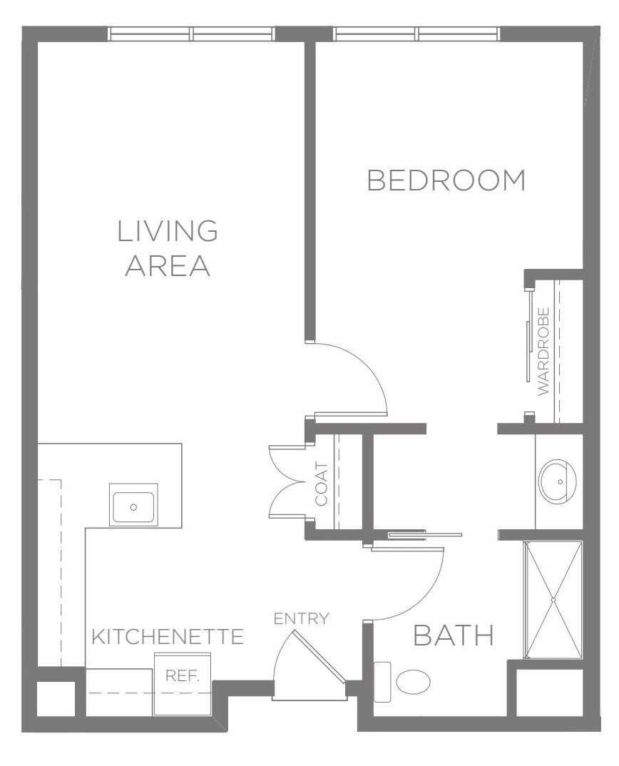 A floor plan of a one-bedroom apartment featuring a living area, kitchenette, and bathroom.