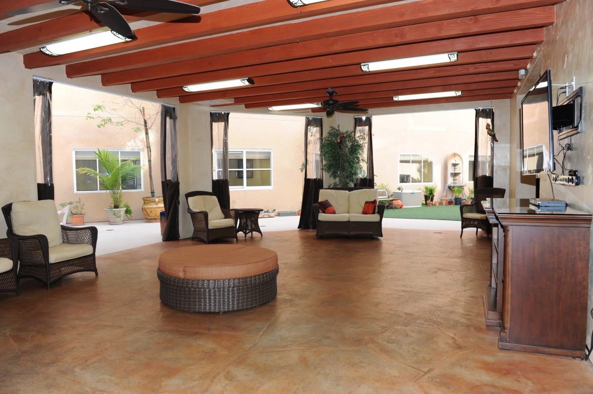 A spacious indoor seating area with comfortable furniture and natural lighting.