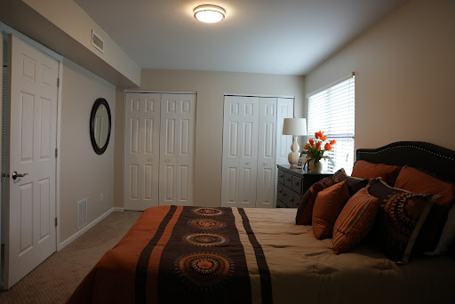 A cozy and elegantly decorated bedroom featuring a comfortable bed and stylish furnishings.