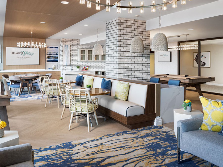 A modern cafe interior with cozy seating and stylish decor.