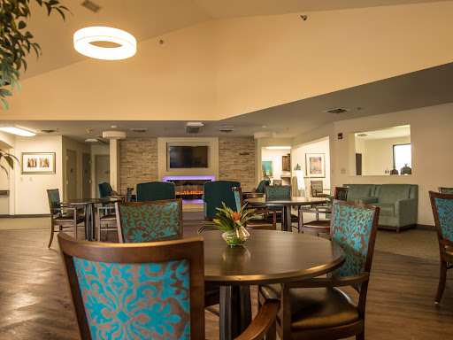 A cozy lounge area featuring stylish seating and modern decor.