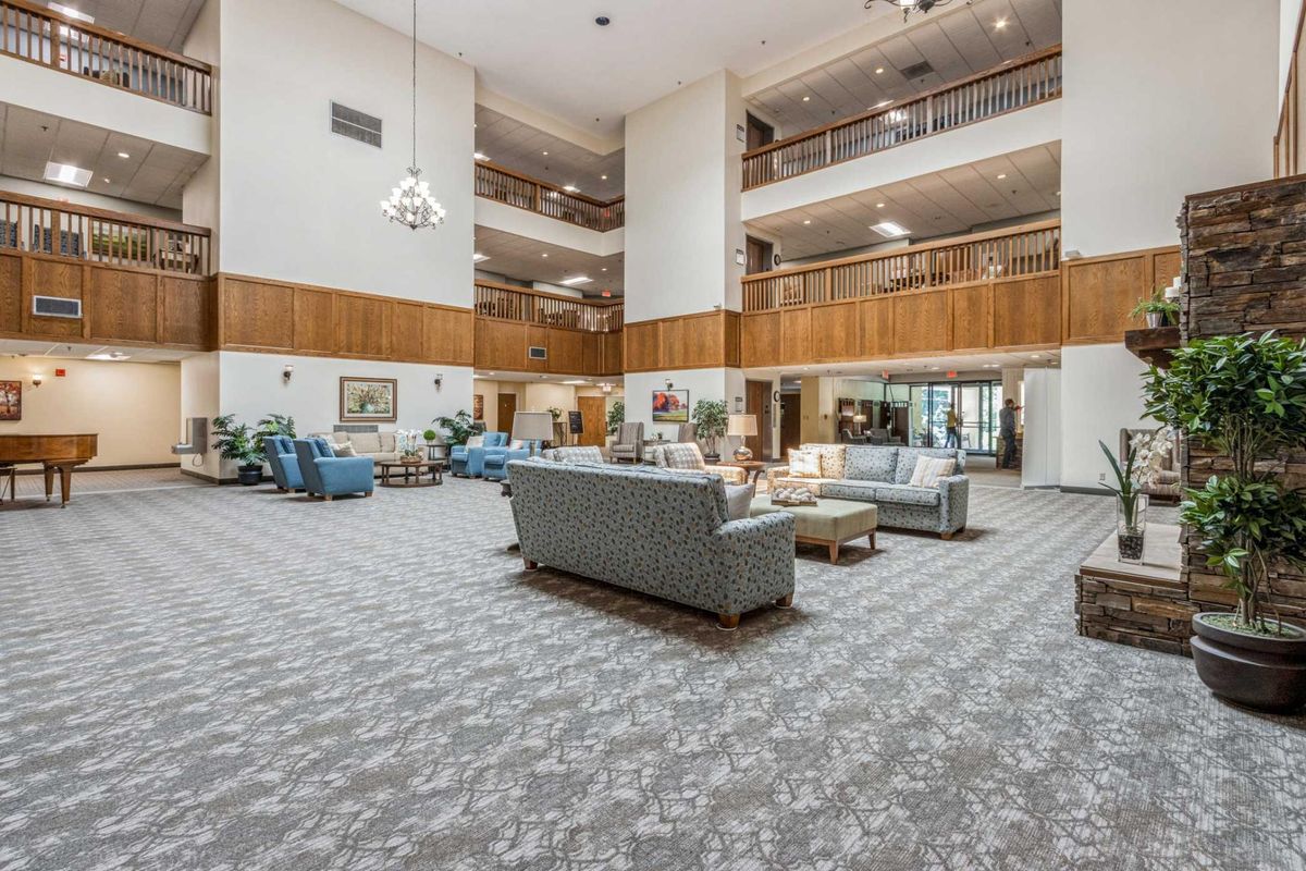 A spacious lobby with comfortable seating and elegant decor.