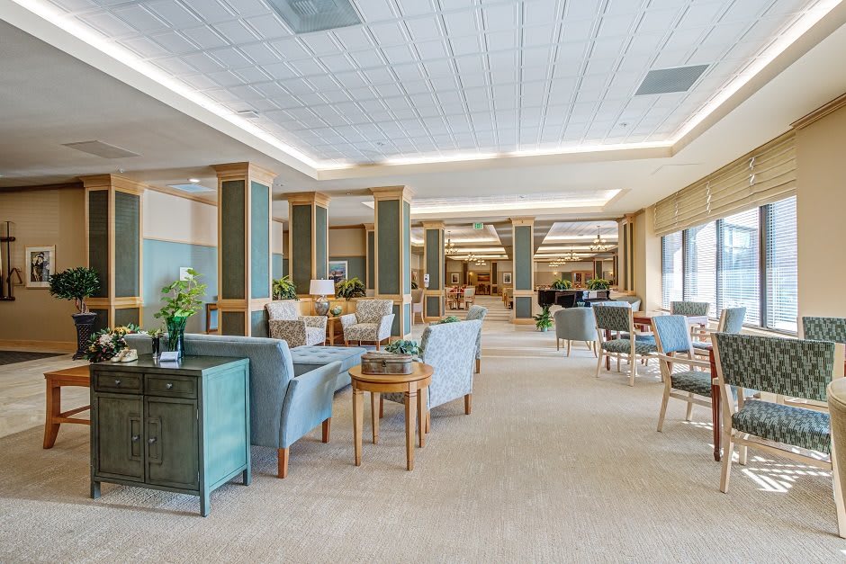 A spacious and modern lounge area with comfortable seating and stylish decor.