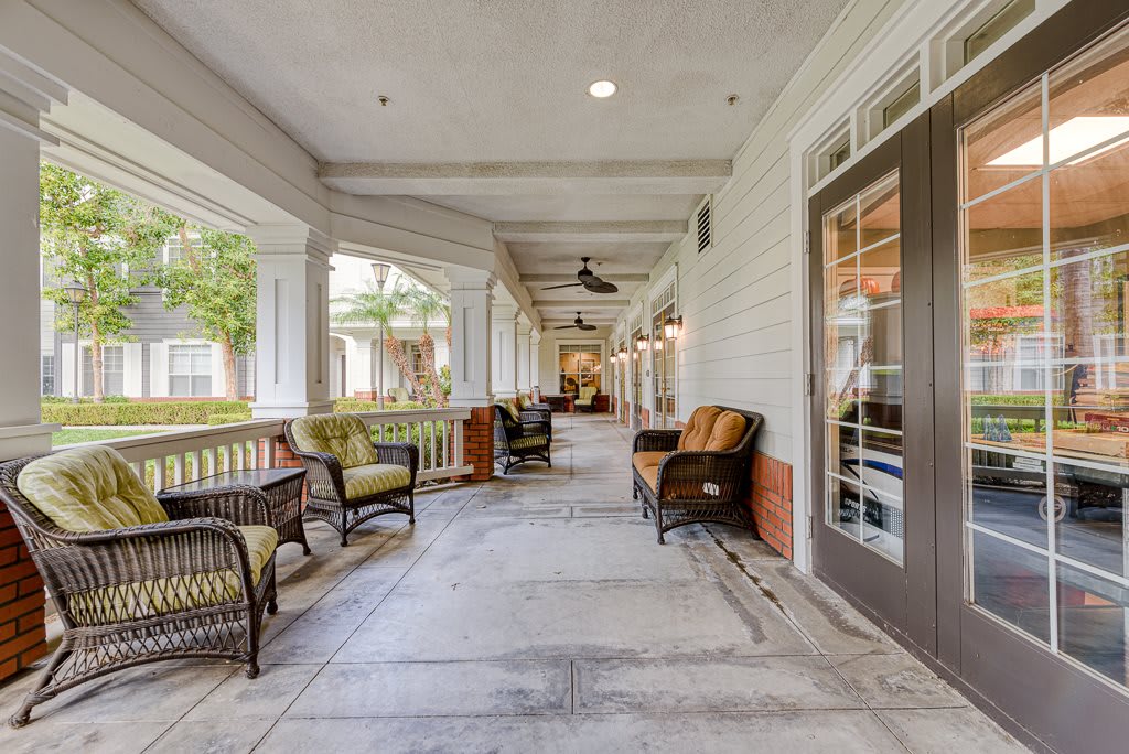A spacious porch with comfortable seating and a serene atmosphere.