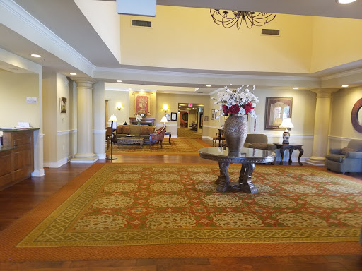 A welcoming hotel lobby featuring comfortable seating and elegant decor.