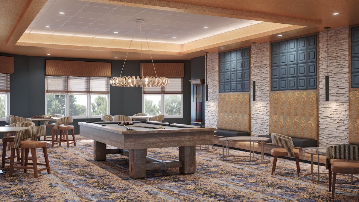 A stylish games room featuring a pool table and modern lighting.