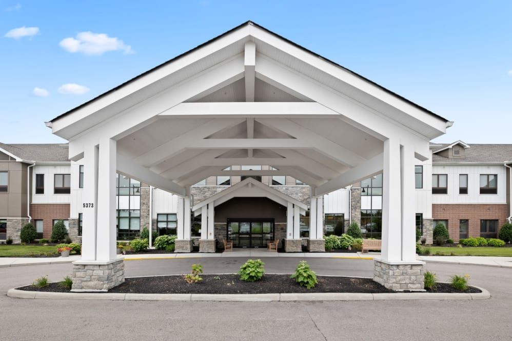 A modern building entrance with a symmetrical design and clean lines.