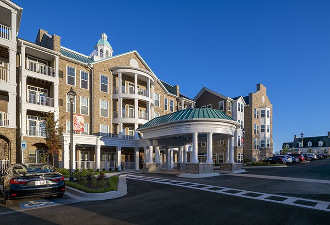 A luxurious hotel building with a grand entrance and elegant architecture.