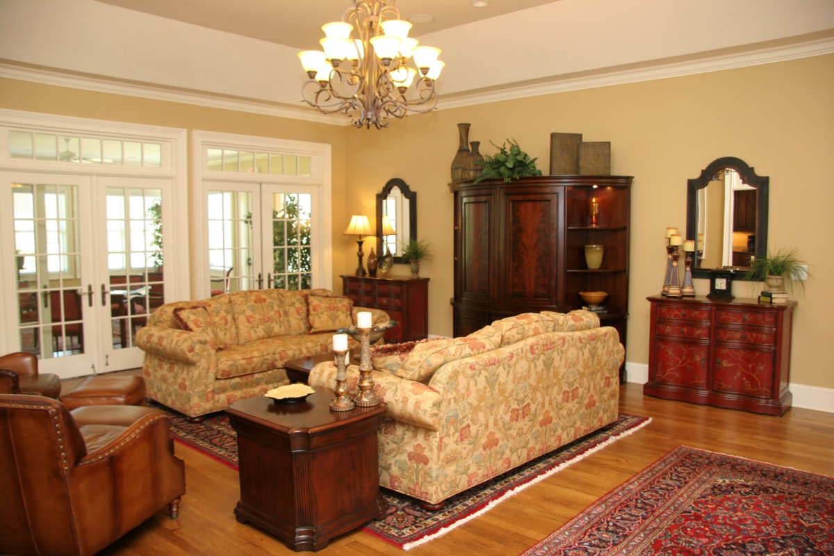 A classic-style living room with elegant furniture and decor.