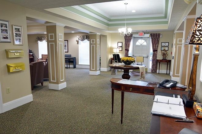 A well-furnished lobby with comfortable seating and elegant decor.