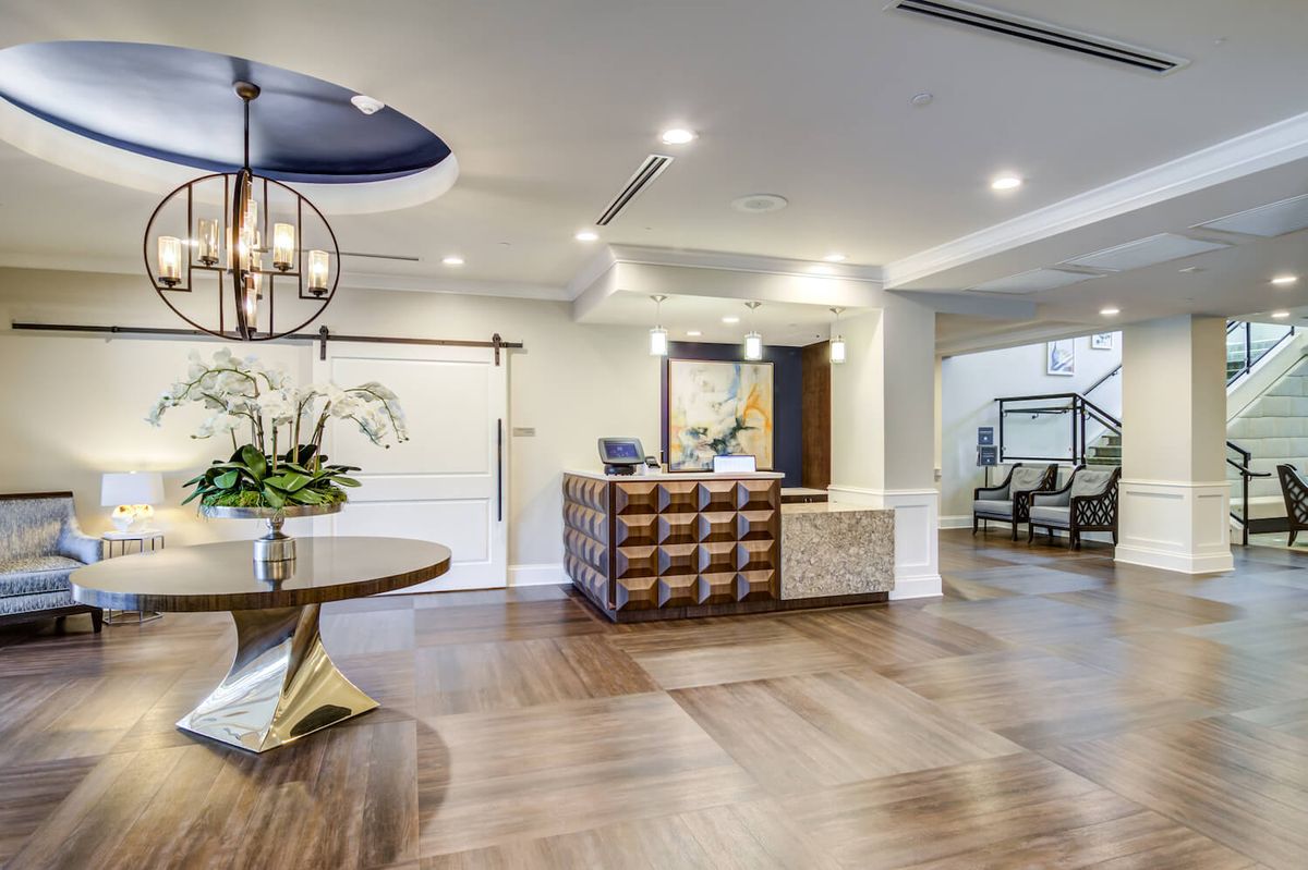 A modern reception area with stylish decor and lighting.