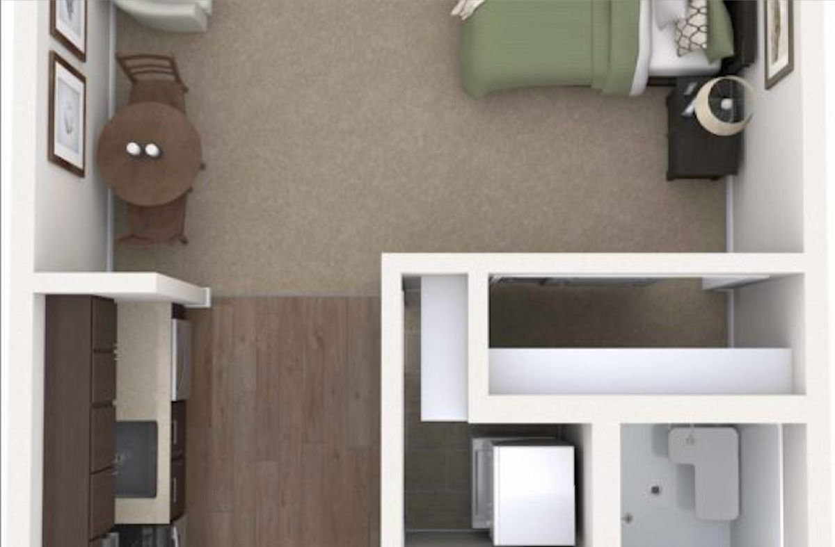 A top-view floor plan showing a bedroom layout with furniture arrangement.