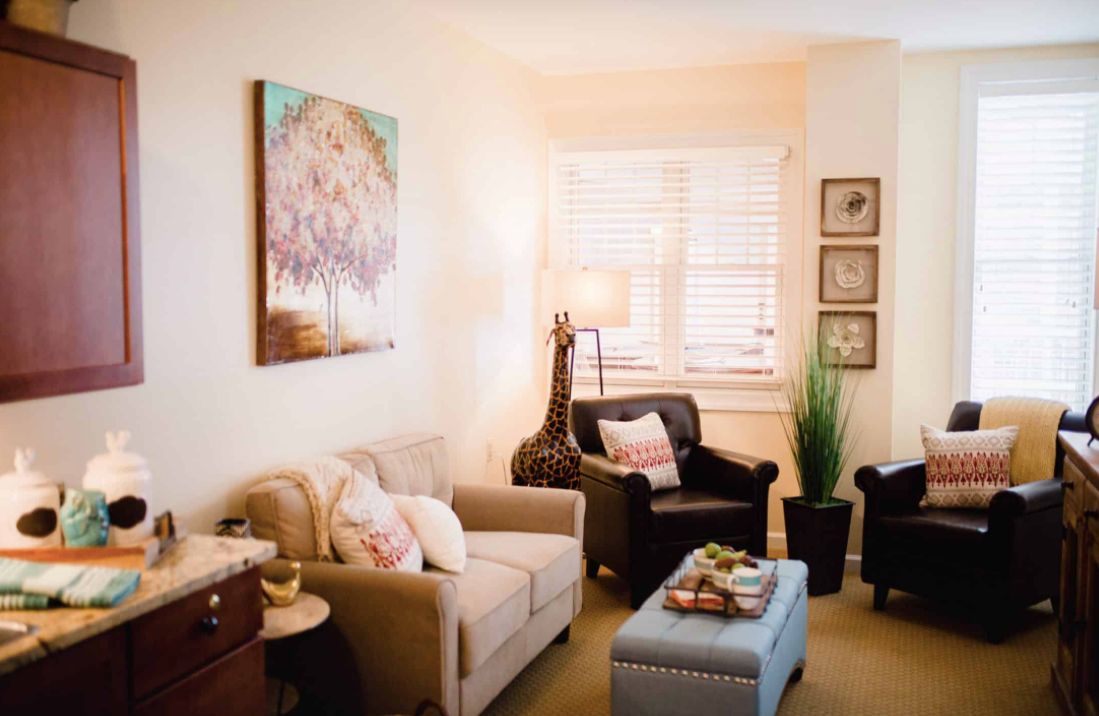 A cozy living room with comfortable seating and stylish decor.