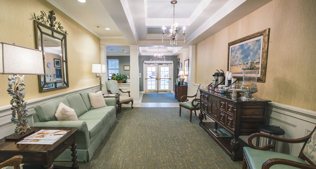 A cozy lobby area with seating and elegant decor.