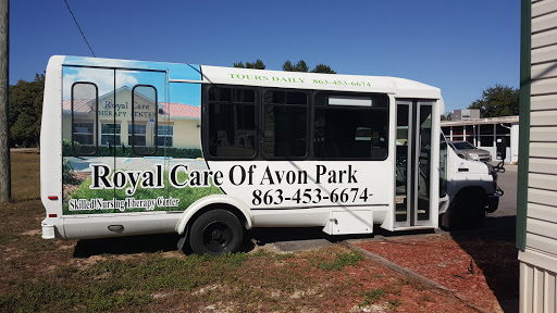 A bus for Royal Care of Avon Park, providing transportation services.