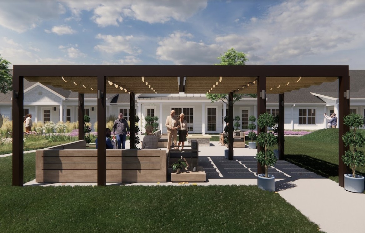 A beautifully landscaped backyard featuring a modern pergola and outdoor seating area.