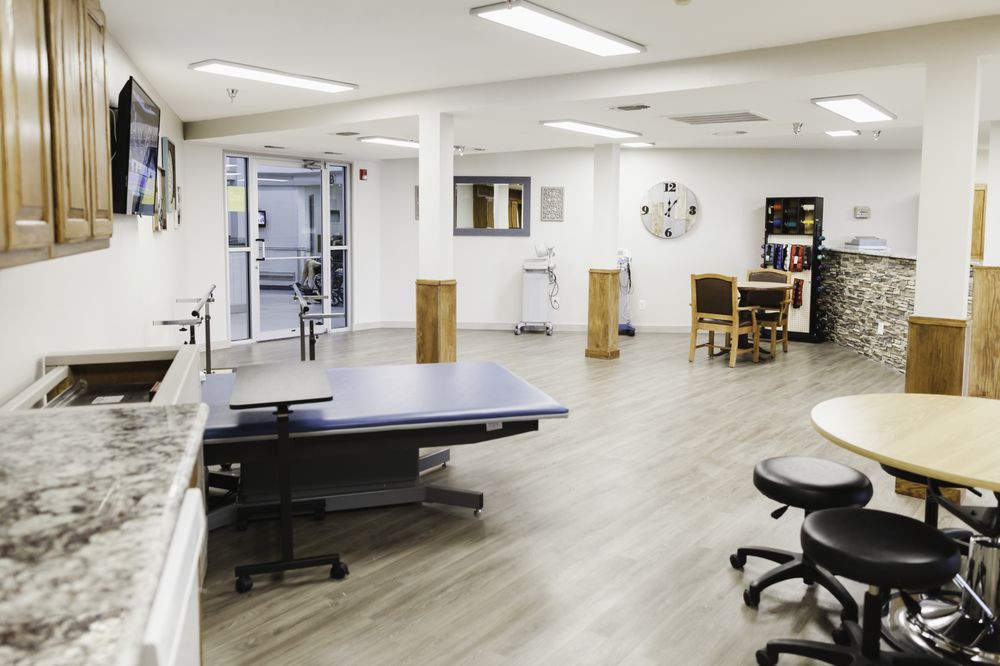 A modern veterinary clinic interior with medical equipment and clean design.