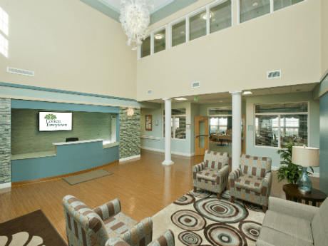 A spacious and elegantly decorated lobby with comfortable seating and modern design elements.
