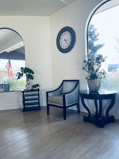 A cozy living space featuring elegant furniture and decorative elements.
