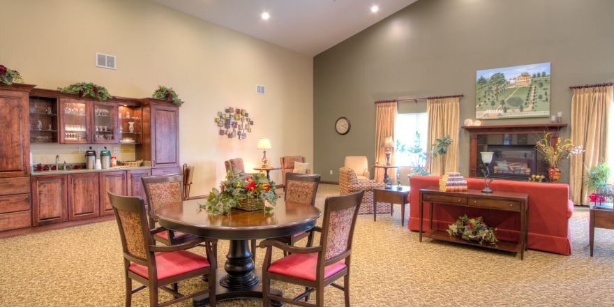 A cozy living room interior with elegant seating and decor.