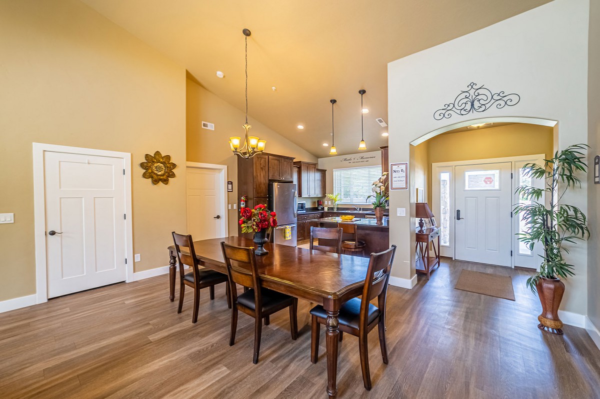 Spacious open-concept dining and kitchen area with modern design.