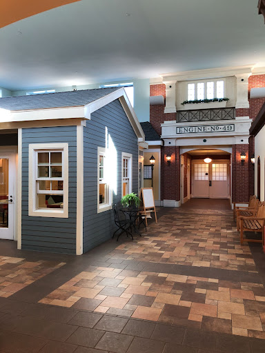 A beautifully designed interior showcasing a model house and building, highlighting architectural details.