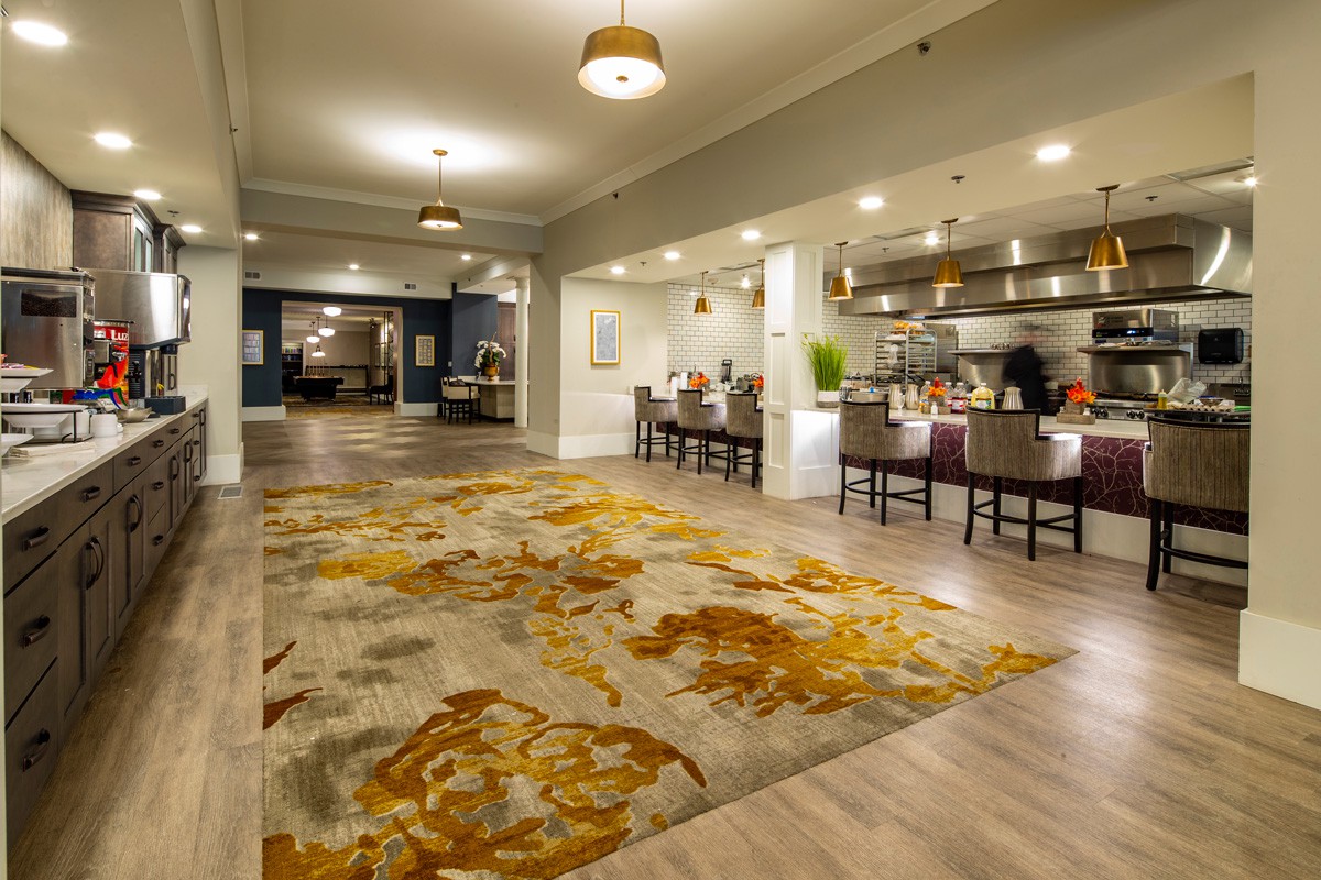 A modern hotel lobby with elegant decor and comfortable seating areas.