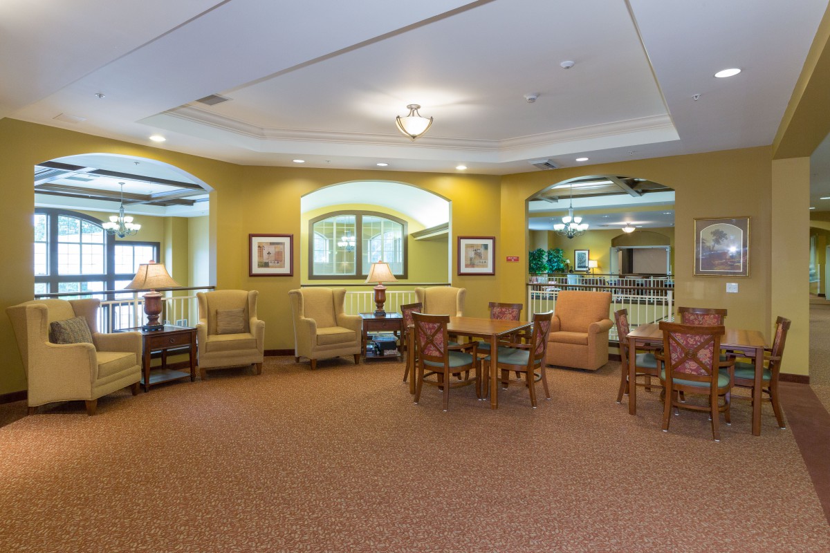 A cozy lounge area with comfortable seating and ambient lighting.
