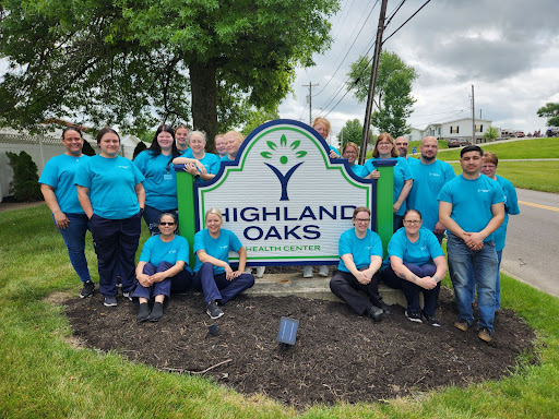 A vibrant team from Highland Oaks gathered for a group photo, showcasing their enthusiasm and community spirit.