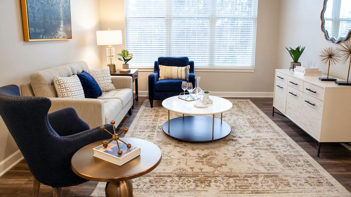 A cozy living room with elegant furniture and a neutral color palette.