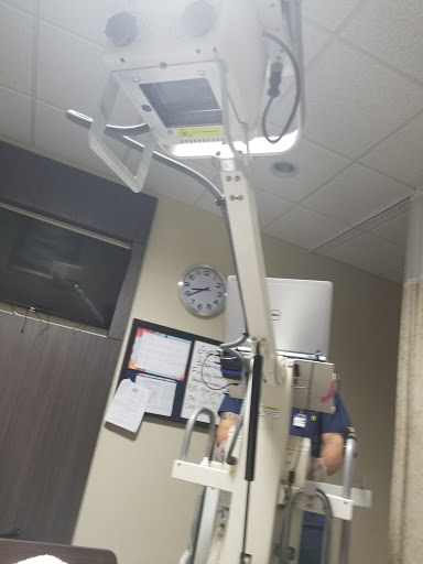 An X-ray machine set up in a medical facility.