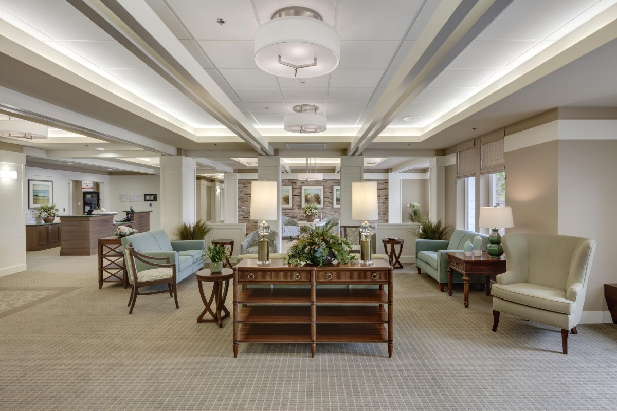 A modern lobby with stylish furniture and soft lighting.