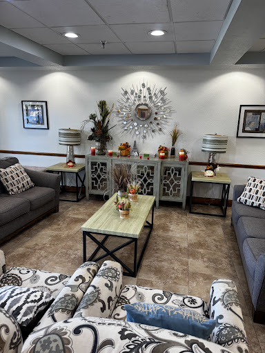 A cozy and elegantly designed living room with contemporary furniture and tasteful decor.