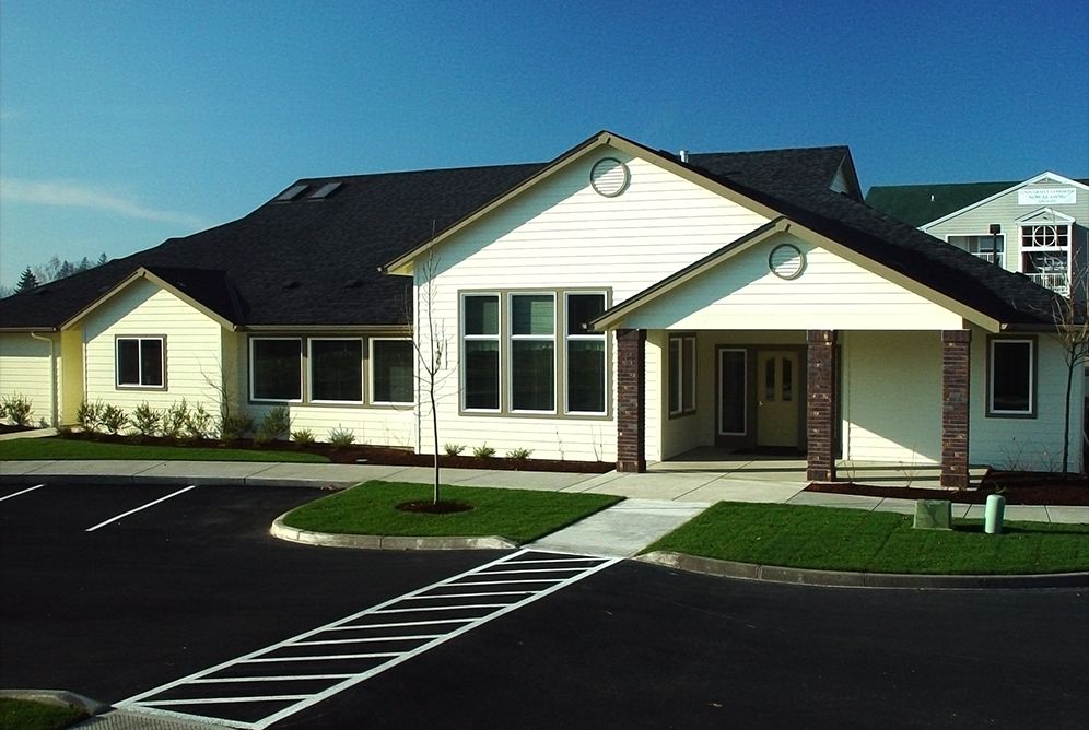 A modern suburban residential house with a clean and well-maintained exterior.