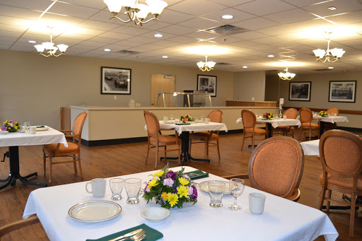 A warm and inviting dining room set up for guests.