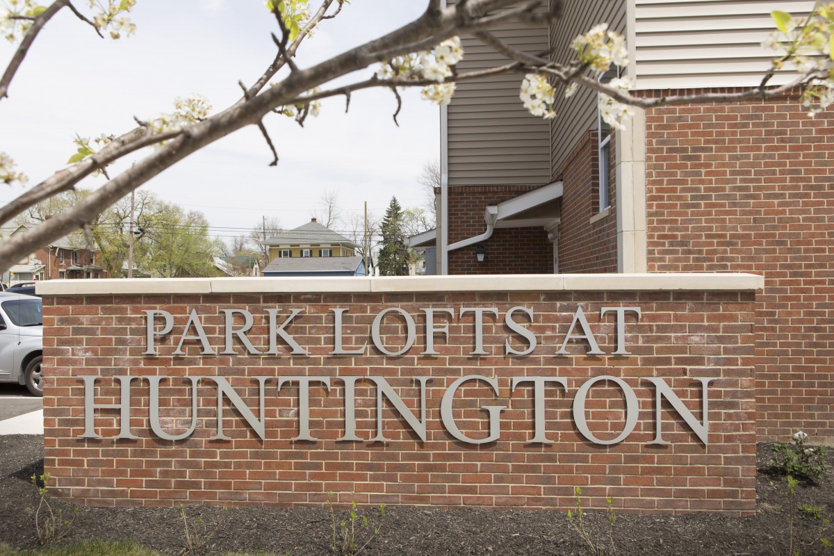 Entrance sign for Park Lofts at Huntington apartments.