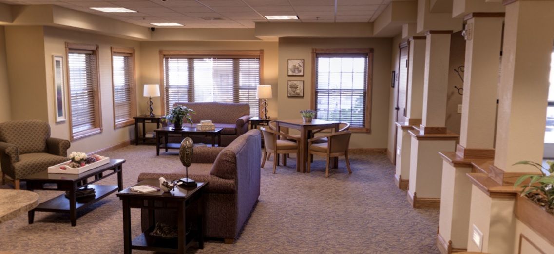 A cozy living room with comfortable seating and natural light.